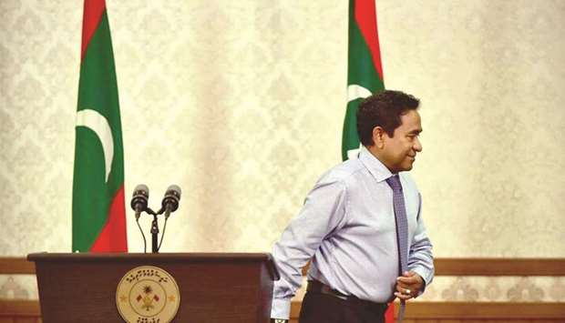 Maldivian President Abdulla Yameen leaves after giving a statement at President office in Male yesterday.