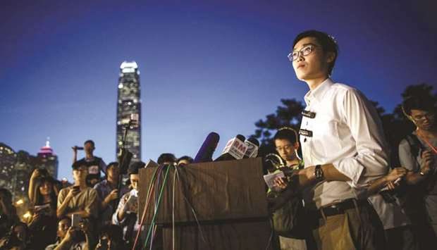 Andy Chan (right), leader of the pro-independence Hong Kong National Party (HKNP), gives a press conference at the start of a rally near the governmentu2019s headquarters in Hong Kong. Hong Kong banned the HKNP, a political party which promotes independence, yesterday, a first since the city was handed back to China by Britain 21 years ago as Beijing ups pressure on any challenges to its sovereignty.