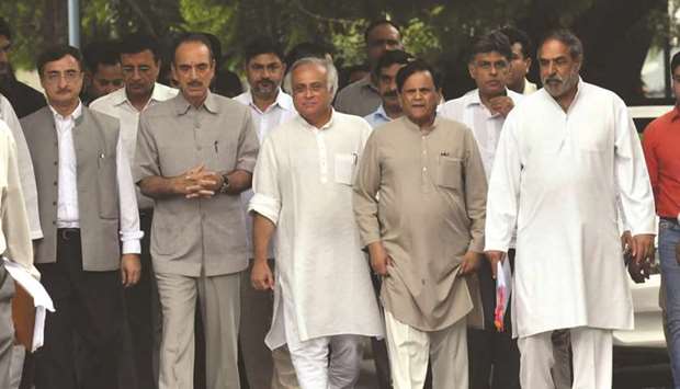 A Congress delegation led by Ghulam Nabi Azad, Jairam Ramesh, Shakeel Ahmad and Anand Sharma arrives at the office of the chief vigilance commissioner to submit a memorandum seeking a probe into the Rafale deal, in New Delhi yesterday.
