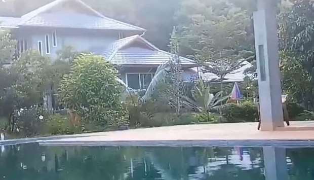 The murdered couple's villa with a swimming pool
