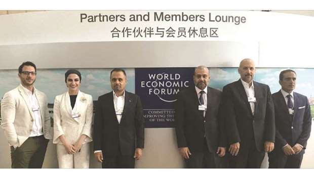 Al-Jaida with officials of Qatari start-ups at the WEFu2019s 12th Annual Meeting of New Champions in Tianjin, China.
