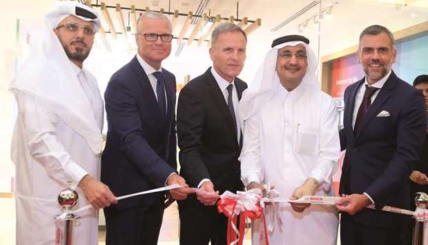 Fifty One East chairman and managing director Bader Abdullah al-Darwish is joined by German ambassador Hans-Udo Muzel, Darwish Holding vice-chairman Saoud Abdullah al-Darwish, BSH T-MEA-CIS region head Norbert Klein, and BSH Home Appliances FZE CEO Tomas Alonso during the ribbon-cutting ceremony of Boschu2019s new showroom at Lagoona Mall. PICTURE: Jayan Orma