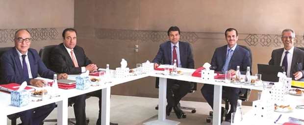 Sheikh Dr Khalid (second right) and Dr Abdulbasit Ahmad al-Shaibei (centre) among other directors at the meeting of the Umnia Bank board of directors in Morocco recently.