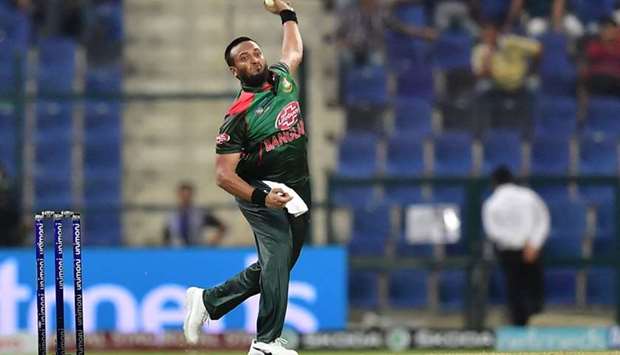 Bangladesh player Shakib Al Hasan bowls during the one day international (ODI) Asia Cup cricket match between Afghanistan and Bangladesh at the Sheikh Zayed Stadium in Abu Dhabi on September 23, 2018