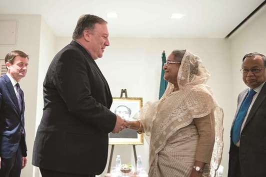 US Secretary of State Mike Pompeo, second left, shakes hands with Bangladeshi Prime Minister Sheikh Hasina in New York yesterday.