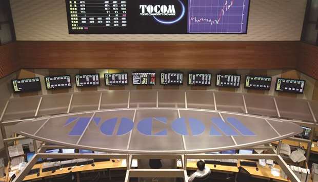 The Tokyo Commodity Exchange logo is displayed on the Tocom trading floor in Tokyo (file). Tocom is seeking to double rubber trading with the launch of a new contract next month that targets Thai producers and Chinese consumers.