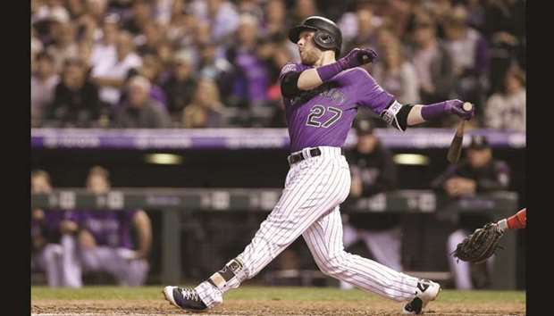 Colorado Rockiesu2019 Trevor Story watches his ball on a two-run home-run in the fifth inning against the Philadelphia Phillies in Denver, Colorado, on Thursday. (USA TODAY Sports)