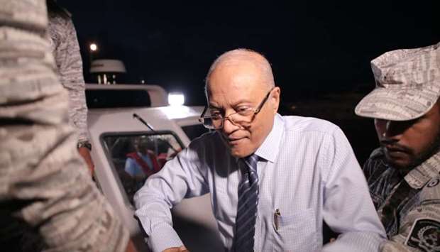 Former President Of Maldives Maumoon Abdul Gayoom (C) disembarks from a boat coming from the custodial island of Dhoonidhoo to attend a hearing at the High Court of Maldives in Male.