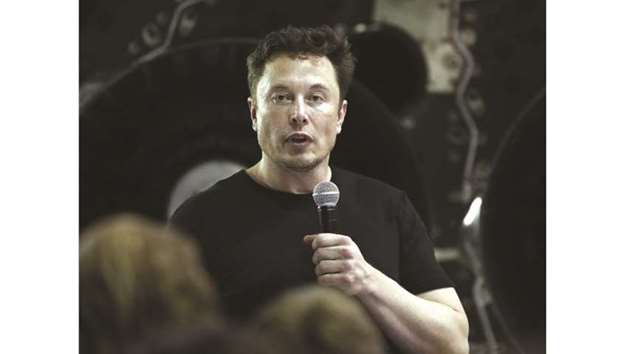Elon Musk, CEO of Space Exploration Technologies Corp (SpaceX), speaks during an event at the SpaceX headquarters in Hawthorne, California, on September 17. The SEC on Thursday charged Musk with misleading investors with tweets on August 7 that said he was considering taking Tesla private at $420 a share and had secured funding.
