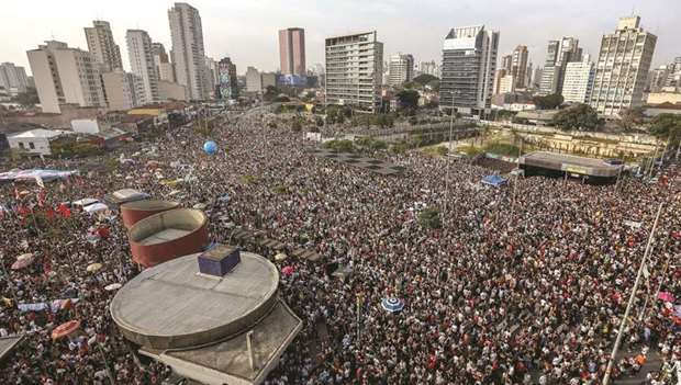 Demonstrators protest against Brazilian right-wing presidential candidate Jair Bolsonaro at Largo da Batata in Sao Paulo, Brazil.