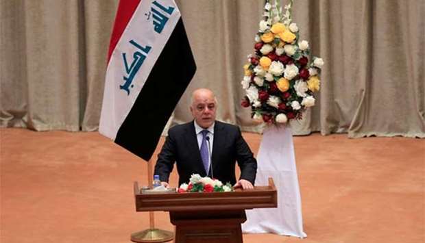 Prime Minister Haider al-Abadi speaks during the first session of the new Iraqi parliament in Baghdad on Monday.