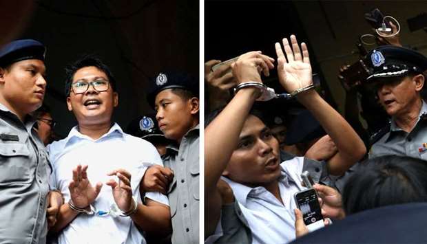 Reuters journalists Wa Lone (L) and Kyaw Soe Oo depart Insein court after the verdict announcement in Yangon, Myanmar.