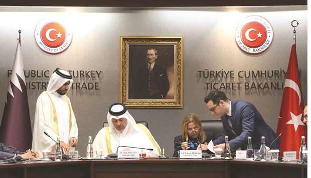 HE the Minister of Economy and Commerce Sheikh Ahmed bin Jassim bin Mohamed al-Thani and Turkish Trade Minister Ruhsar Pekcan signing the agreement in Ankara yesterday.