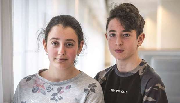 This picture taken on August 13 in The Hague shows Armenian teens Howick and Lili, who face imminent expulsion from the Netherlands.