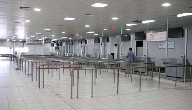 A man stands in the empty Mitiga International Airport in Tripoli on Tuesday.