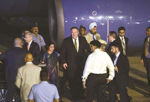 US Secretary of State Mike Pompeo walks next to Foreign Minister Sushma Swaraj after arriving at Air Force Station in Palam in New Delhi yesterday. Pompeo and Defence Secretary Jim Mattis and their Indian counterparts are meeting in New Delhi today, where they will discuss a number of issues on trade and defence.