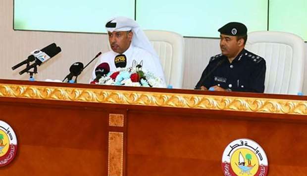 HE the Minister of Administrative Development, Labour and Social Affairs Dr Issa Saad al-Jafali al-Nuaimi and General Directorate of Passports director Brigadier Mohamed Ahmed al-Ateeq at the press conference on Thursday. PICTURE: Ram Chand.