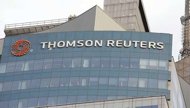 Thomson Reuters logo is seen on the company building in New York. A consortium led by Blackstone is putting together $13.5bn of bond and loan financing this month to buy a majority stake in Thomson Reuters financial terminal business.