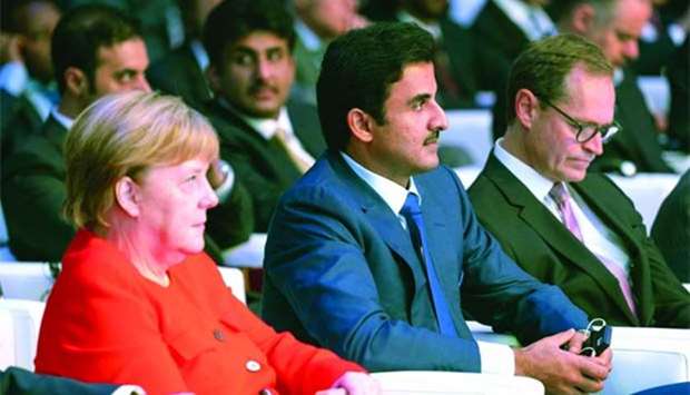 His Highness the Amir Sheikh Tamim bin Hamad al-Thani with German Chancellor Angela Merkel and German Foreign Minister Heiko Maas at the 9th Qatar-German Business and Investment Forum in Berlin on Friday.