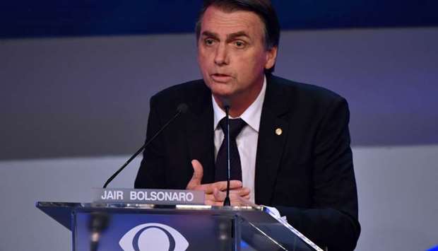 Brazilian presidential candidate Jair Bolsonaro (PSL), speaks during the first presidential debate ahead of the October 7 general election, at Bandeirantes television network in Sao Paulo, Brazil, on on August 9, 2018.