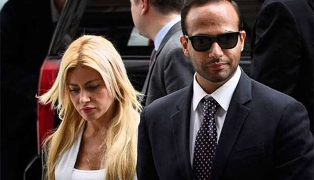 George Papadopoulos and his wife Simona Mangiante Papadopoulos arrive at US District Court for his sentencing in Washington, DC on Friday.