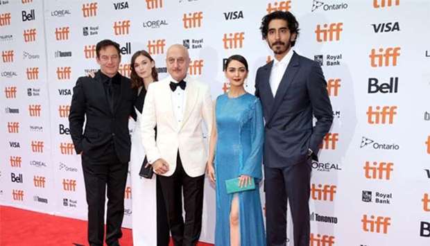 Jason Isaacs, Tilda Cobham-Hervey, Anupam Kher, Nazanin Boniadi and Dev Patel attend the 'Hotel Mumbai' premiere during 2018 Toronto International Film Festival at Princess of Wales Theatre in Toronto.