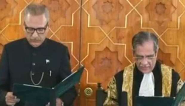 Arif Alvi being administered the oath in Islamabad on Sunday. Picture: Express Tribune