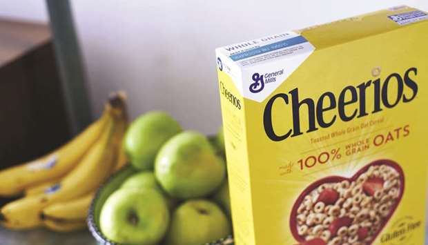 A box of General Mills Cheerios brand cereal is arranged for a photograph in the Brooklyn Borough of New York (file). General Mills spent five years and built a special eight-story sorting facility to get rid of an ingredient that wasnu2019t in its cereal. The increasing demand for food u201cfree fromu201d certain items u2013 including gluten, antibiotics, pesticides or genetic modification u2013 is changing the way companies procure, process and package your food.
