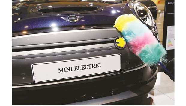 Mini Electric is pictured at the 2019 Frankfurt Motor Show yesterday. Germanyu2019s premium automakers are now marketing electric cars as their flagship models, a strategy which Daimler, Volkswagen and BMW hope will lure customers away from gas-guzzling SUVs that could soon land them with hefty fines under new EU emissions rules.