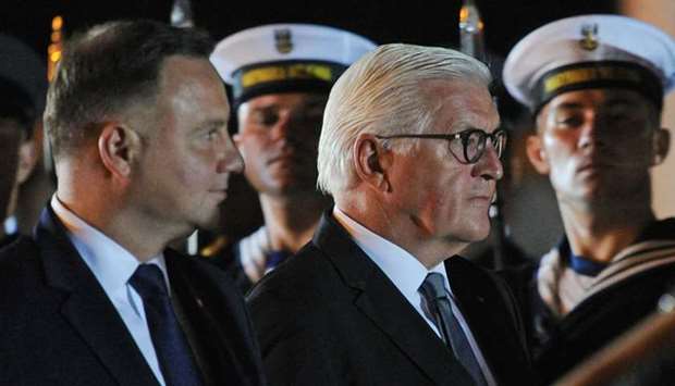 German President Frank-Walter Steinmeier (R) and his Polish counterpart Andrzej Duda attend ceremonies marking the 80th anniversary of the outbreak of WWII, in Wielun
