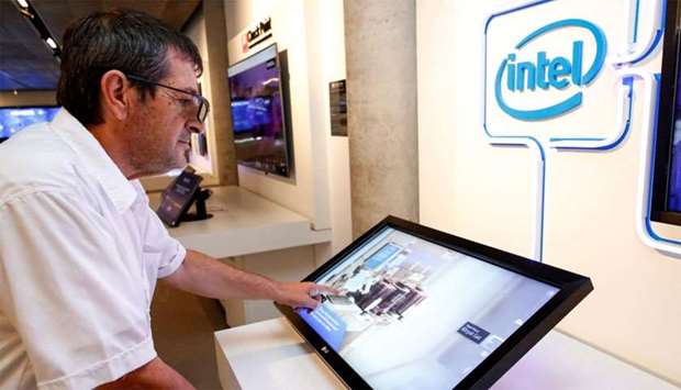A visitor interacts with a display by Intel