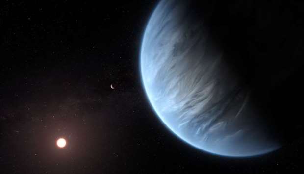 A handout artist's impression released by ESA/Hubble shows the K2-18b super-Earth, the only super-Earth exoplanet known to host both water and temperatures that could support life