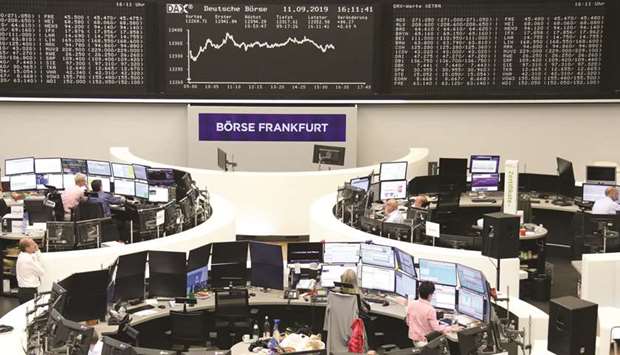 The German share price index DAX graph is seen at the Frankfurt Stock Exchange. The DAX 30 gained 0.8% to 12,359.07 points yesterday.