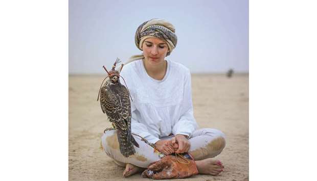 PICTURE OF POISE: Laura Wrede in a pensive frame with her pet bird.
