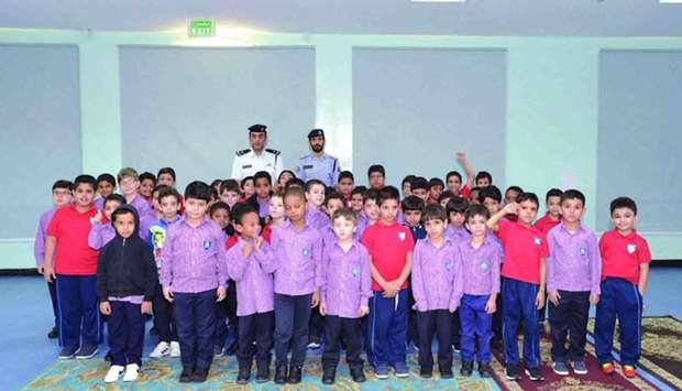 Officers from Traffic Awareness department with school students