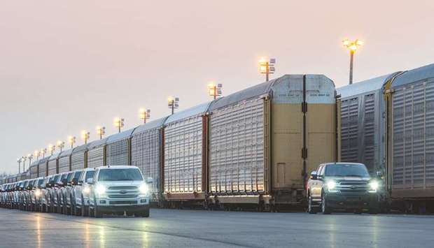 An all-electric Ford F-150 prototype tows more than 1.25mn pounds of rail cars and trucks during a test in Dearborn, Michigan. Now, Ford and GM are racing to design radical new takes on their most profitable models, replacing petroleum-fuelled engines with batteries in a bid to outflank Teslau2019s plan to eclipse their brands.