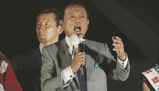 Taro Aso, Japanu2019s finance minister, speaks during a campaign event in Tokyo. Aso said yesterday it was up to the Bank of Japan to make monetary policy decisions, adding that Japanu2019s economic fundamentals remained solid.
