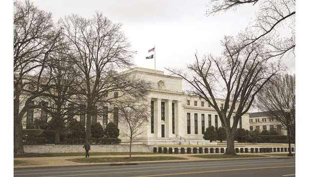 The US Federal Reserve building in Washington, DC. The US-China trade war will worsen or at best stay the same over the coming year, according to economists in a Reuters poll who expect the Fed to cut interest rates next week for the second meeting in a row.