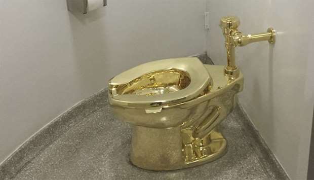 A fully functioning solid gold toilet, made by Italian artist Maurizio Cattelan, is going into public use at the Guggenheim Museum in New York