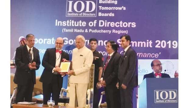 Doha Bank CEO Dr R Seetharaman receiving the professional excellence award from Tamil Nadu governor Banwarilal Purohit during the Corporate Governance Summit in Chennai, India yesterday.