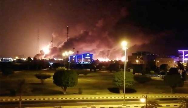 Smoke is seen following a fire at an Aramco factory in Abqaiq, Saudi Arabia