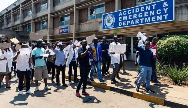 Zimbabwe junior doctors stage a protest march at Parirenyatwa Hospital in Harare protesting the alle