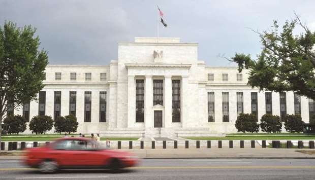 The US Federal Reserve building in Washington, DC. Facing a dauntingly uncertain economic horizon and ceaselessly pelted with insults and demands for stimulus from the US president, the Federal Reserve is set to cut interest rates in the coming week.