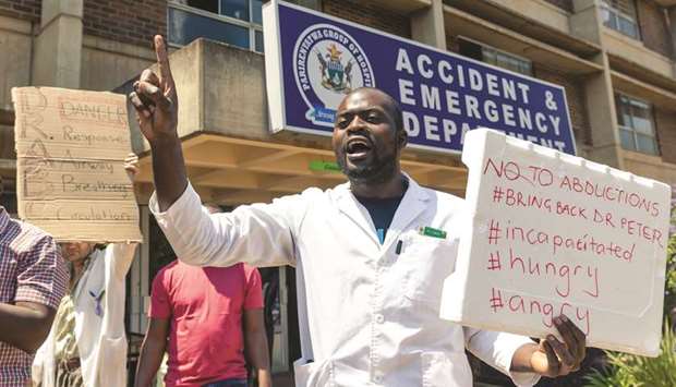 Junior doctors stage a protest march at Parirenyatwa Hospital in Harare yesterday, protesting the alleged abduction of Dr Peter Mugombeyi president of the Zimbabwe Hospital Doctors Association.