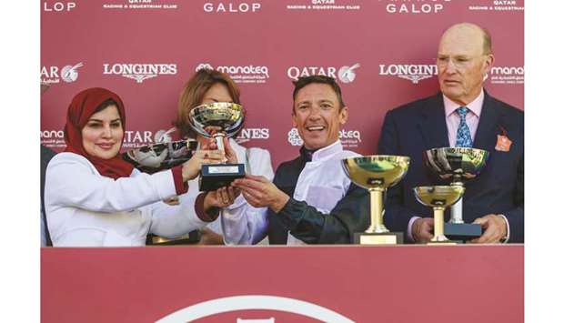 Chargu00e9e Du2019affaires of the embassy of the State of Qatar in Paris Nadia Ahmed al-Sheebi distributed the trophies to the winners of the Qatar Arc Trials day at ParisLongchamp yesterday. PICTURES: Zuzanna Lupa