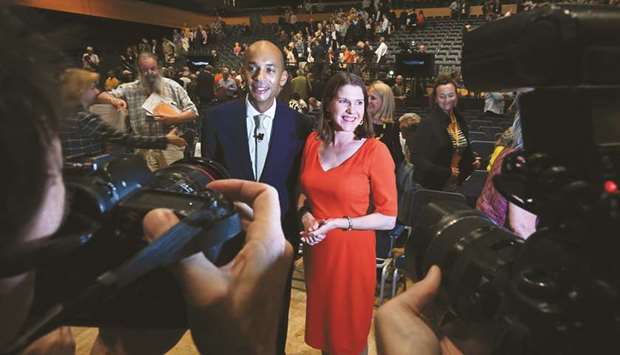 Liberal Democrat MP Chuka Umunna poses with Liberal Democrat leader Jo Swinson after speaking at the Liberal Democrat party conference in Bournemouth yesterday. The LibDems have overwhelmingly approved the partyu2019s plan of going into an election with the promise to revoke Brexit without a referendum.