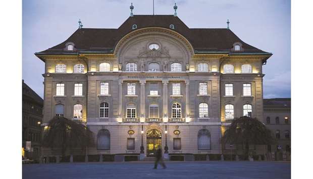 The headquarters of the Swiss National Bank in Bern. The SNB will shrug off the European Central Banku2019s latest interest rate cut and not trim its own negative rate when it gives its latest monetary policy update tomorrow, according to analysts polled by Reuters.