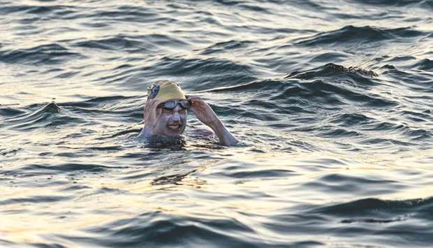 US swimmer Sarah Thomas swims in the Dover Strait, 10 miles off the English coast, on the first leg of her non-stop four leg, 54 hour, cross-Channel swim between England and France.
