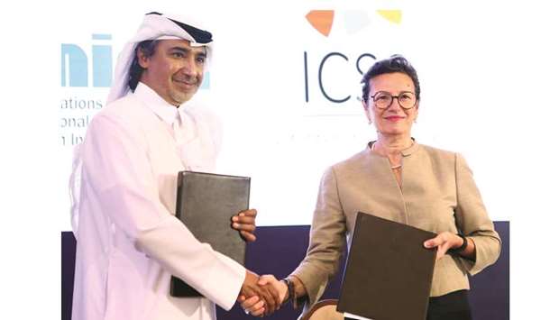 Mohamed Hanzab and Bettina Tucci Bartsiotas during the agreement signing at SIGA Inter-Regional Summit in Doha yesterday. PICTURE: Ram Chand
