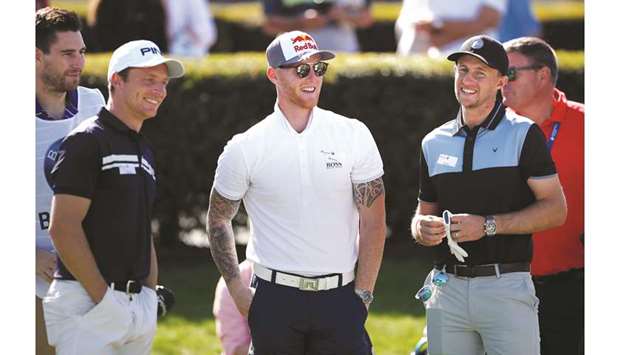 Englandu2019s cricket players Joe Root (right), Ben Stokes (centre) and Jos Buttler during the Pro-Am event of the BMW PGA Championship  at Wentworth Golf Club, Virginia Water, Britain, yesterday. (Reuters)